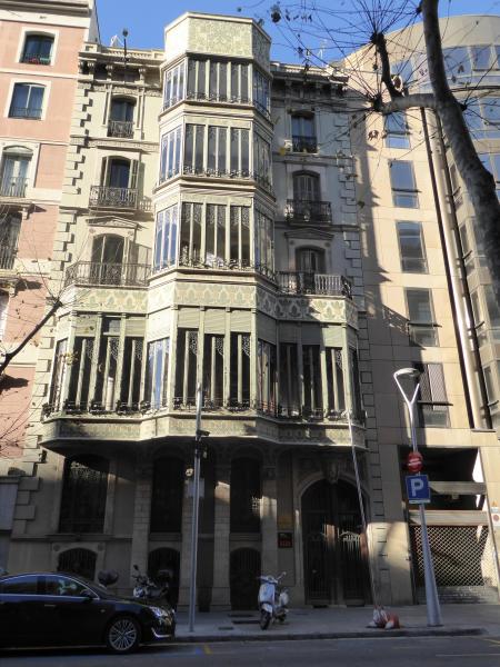 Rear facade of Palau del Baró de Quadras, Carrer del Rosselló, Eixample, Barcelona, Catalonia, December 2014