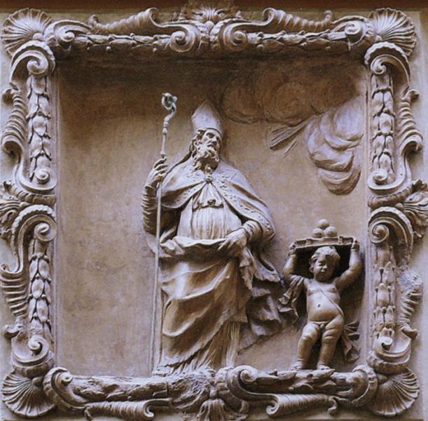 Relief of St Nicholas over the church door