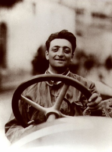 Enzo Ferrari driving a race car