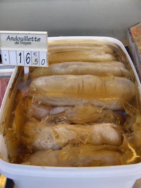 Andouillette for sale at a charcuterie in Montmartre, Paris (France).