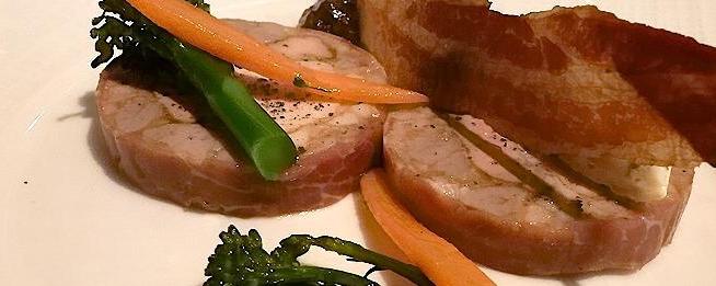 Rabbit ballotine with crisp pancetta, prune purèe and grain mustard.