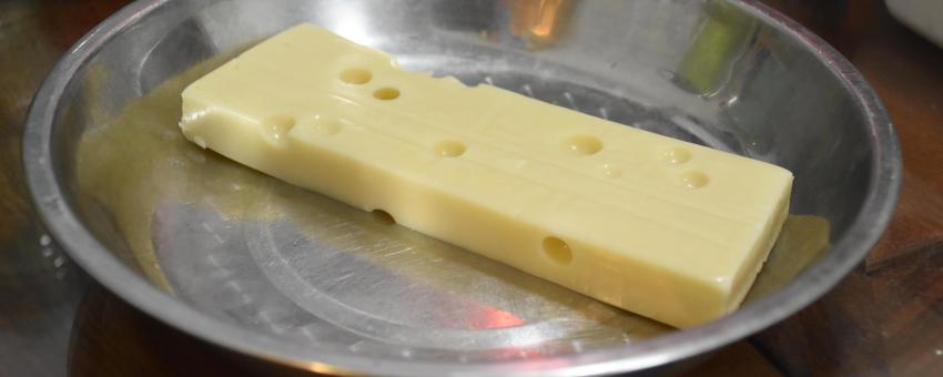 A slice of Emmental Cheese at home