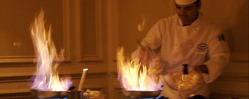 The chef prepares the Crêpe Suzette