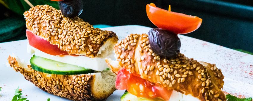 bread, sliced cucumber, and tomatoes on plate