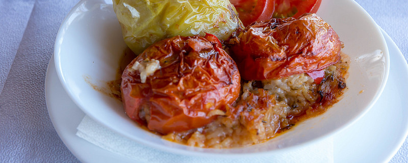 Close-up of Greek style stuffed tomatoes and peppers