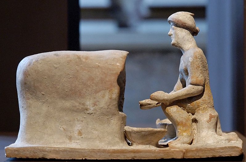 5th century BC terracotta baker, Tanagra