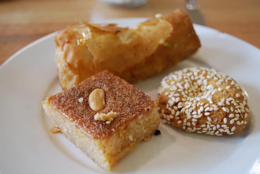 Harissa Slice AUD1.50, Aniseed Sesame Cookie AUD1, Cheese and Jam Cigar AUD4 - Oasis Bakery