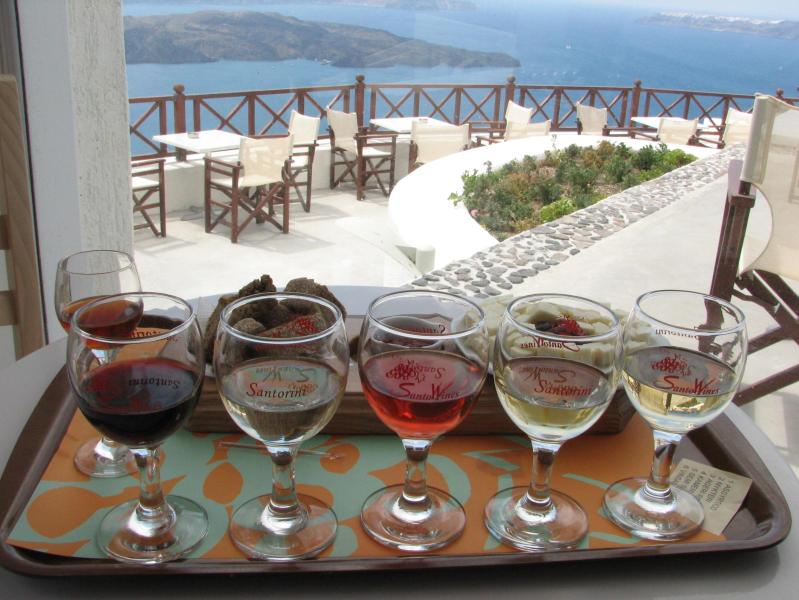 Several examples of Greek wines from Santorini ranging from whites with no oak, slightly oaked whites, roses and red wines.