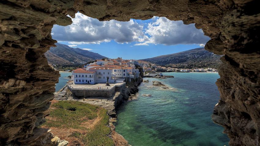 Town of Chora in Andros island through a ruin