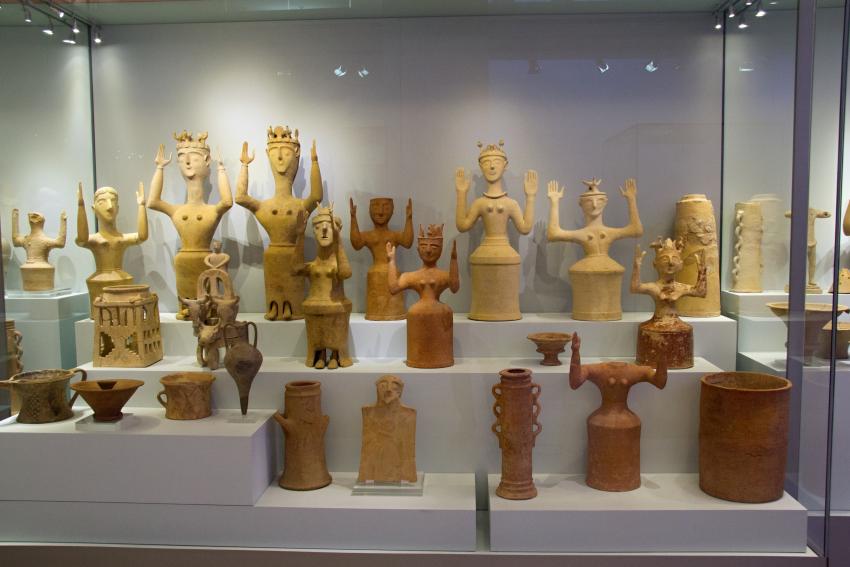 Collection of sacral terracottas from Gazi near Heraklion, especially goddesses with upraised arms. 1300-1100 BC. Archaeological museum of Heraklion.
