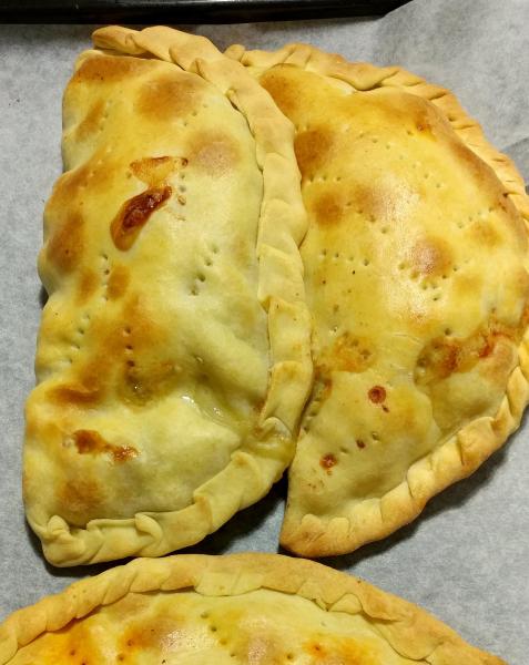 half moon shaped baked good filled with minced meat from Rotondella, Italy