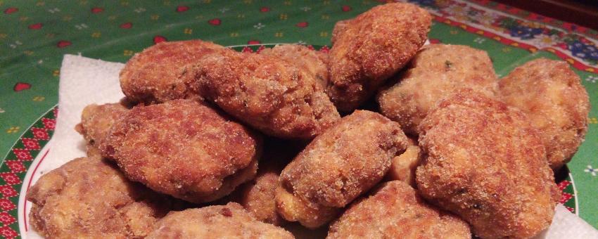 Mondeghili, traditional fried beef and pork meatballs from Lombardy, Italy with thier typical form